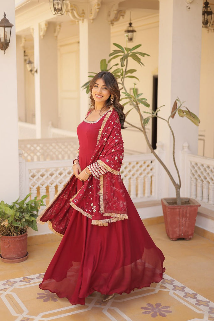 Embrace timeless elegance with our meticulously crafted Vichitra silk Maroon gown and dupatta set. ClothsVilla