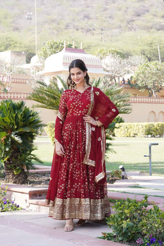 Embroidered Faux Blooming Georgette Flared Maroon Gown with Dupatta ClothsVilla