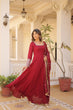 Load image into Gallery viewer, Embrace timeless elegance with our meticulously crafted Vichitra silk Maroon gown and dupatta set. ClothsVilla