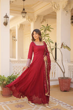 Load image into Gallery viewer, Embrace timeless elegance with our meticulously crafted Vichitra silk Maroon gown and dupatta set. ClothsVilla