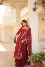 Load image into Gallery viewer, Embrace timeless elegance with our meticulously crafted Vichitra silk Maroon gown and dupatta set. ClothsVilla