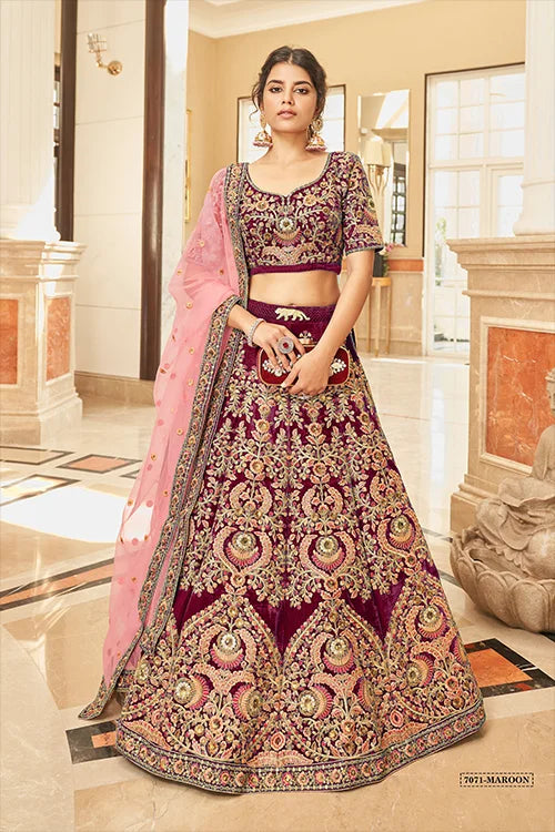 Designer Maroon Velvet Lehenga with Net Dupatta Clothsvilla