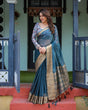 Load image into Gallery viewer, Teal Blue Plain Chiffon Saree with Gold Zari Border, Floral Printed Blouse &amp; Tassel Detailing CHIFFON