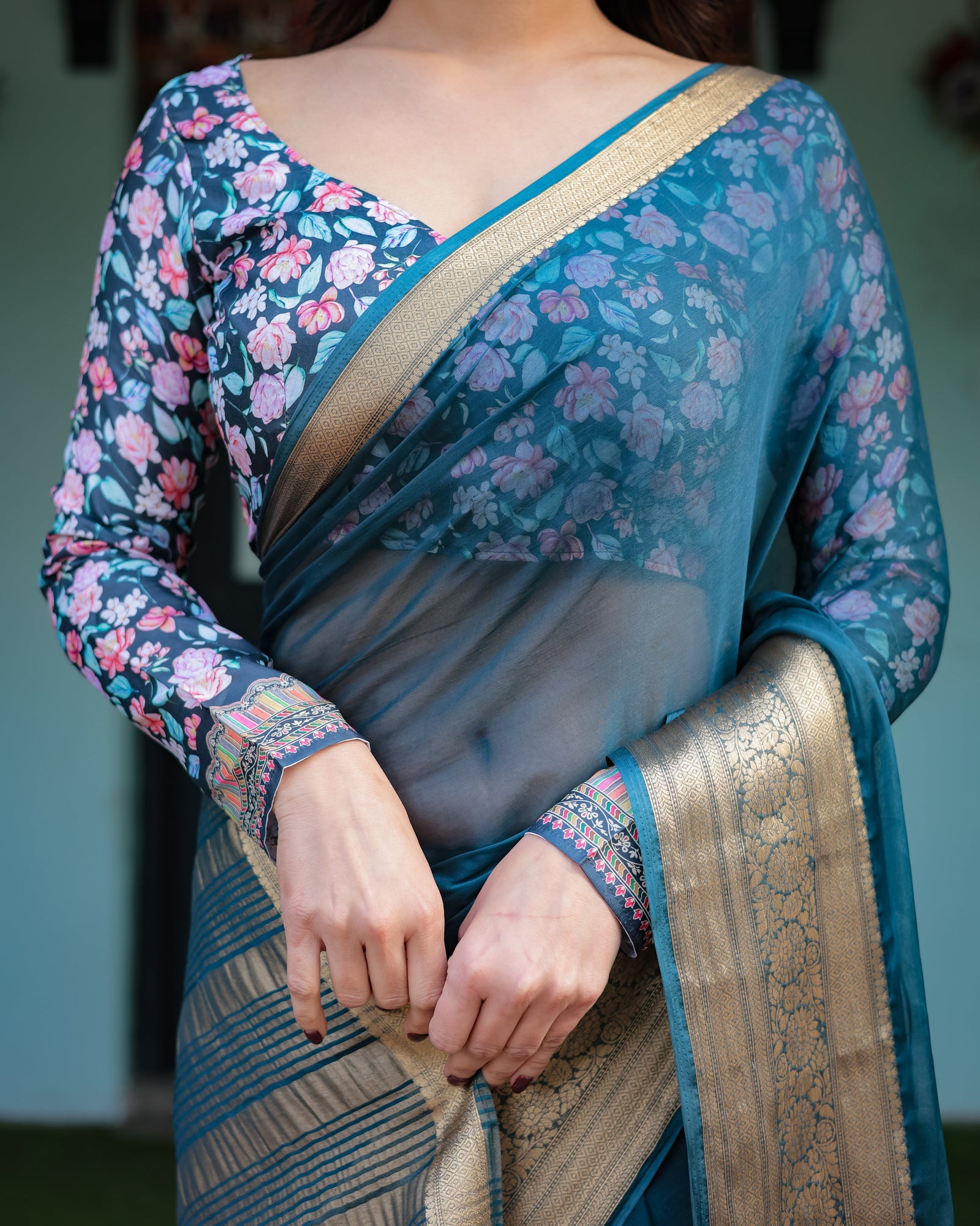 Teal Blue Plain Chiffon Saree with Gold Zari Border, Floral Printed Blouse & Tassel Detailing CHIFFON