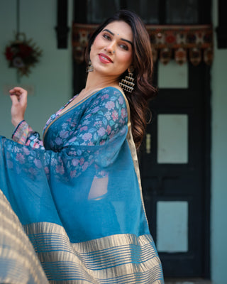 Teal Blue Plain Chiffon Saree with Gold Zari Border, Floral Printed Blouse & Tassel Detailing CHIFFON