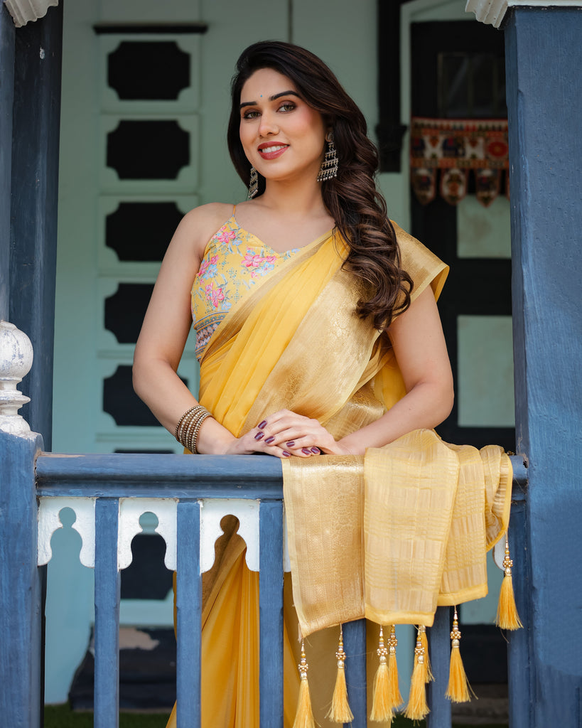Golden Yellow Plain Chiffon Saree with Gold Zari Border, Floral Printed Blouse & Tassel Detailing CHIFFON