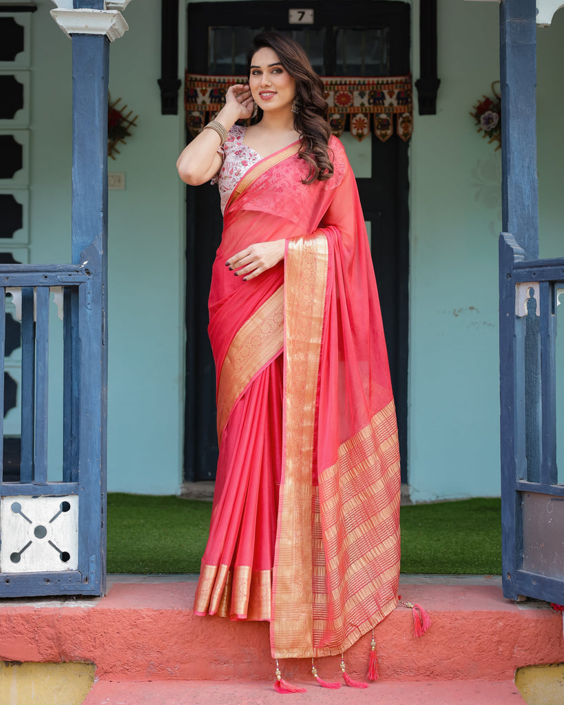 Vibrant Coral Pink Plain Chiffon Saree with Gold Zari Border, Floral Ruffled Blouse & Tassel Detailing CHIFFON