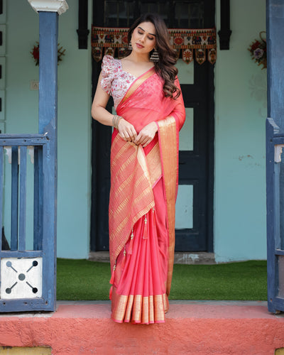 Vibrant Coral Pink Plain Chiffon Saree with Gold Zari Border, Floral Ruffled Blouse & Tassel Detailing CHIFFON