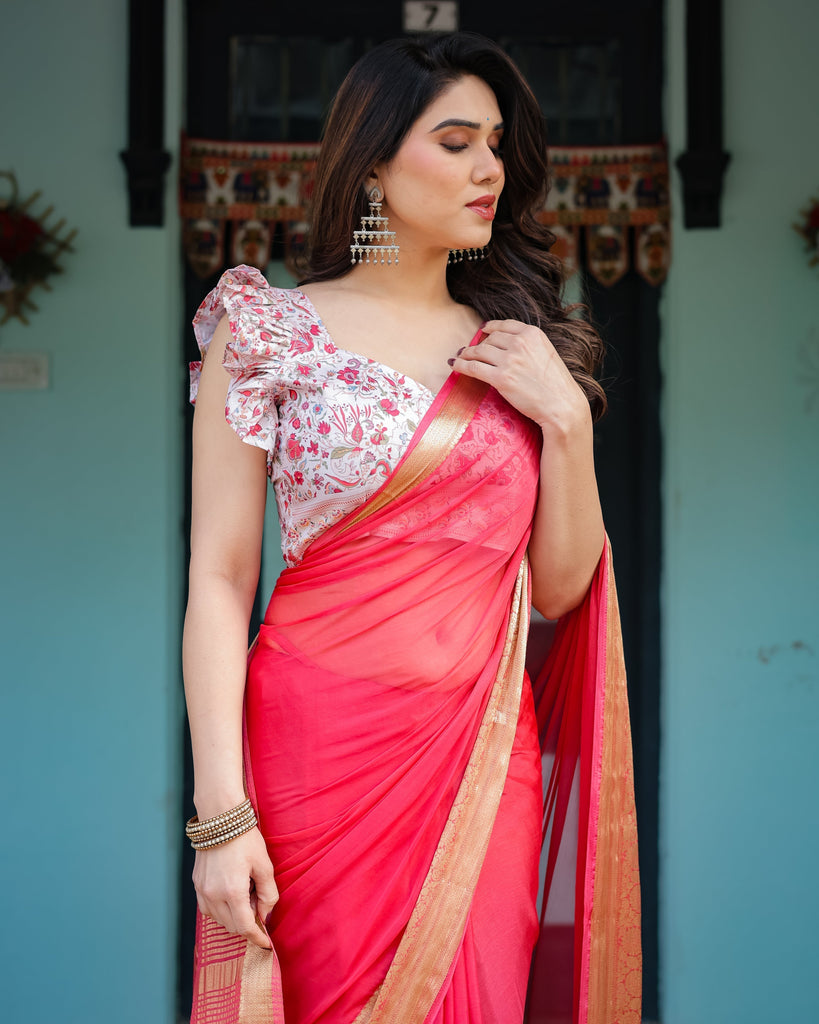 Vibrant Coral Pink Plain Chiffon Saree with Gold Zari Border, Floral Ruffled Blouse & Tassel Detailing CHIFFON