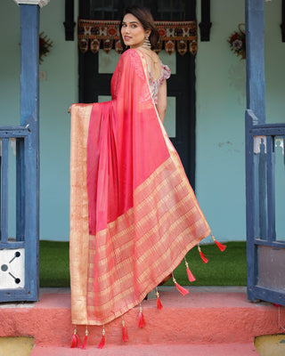 Vibrant Coral Pink Plain Chiffon Saree with Gold Zari Border, Floral Ruffled Blouse & Tassel Detailing CHIFFON