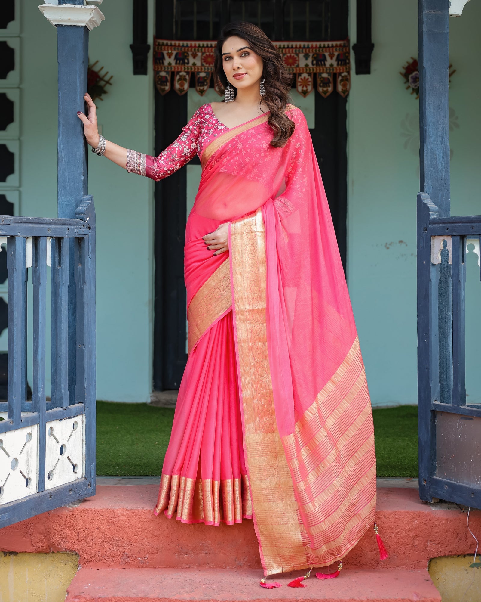 Ravishing Rani Pink Plain Chiffon Saree with Gold Zari Border, Floral Printed Blouse & Tassel Accents CHIFFON