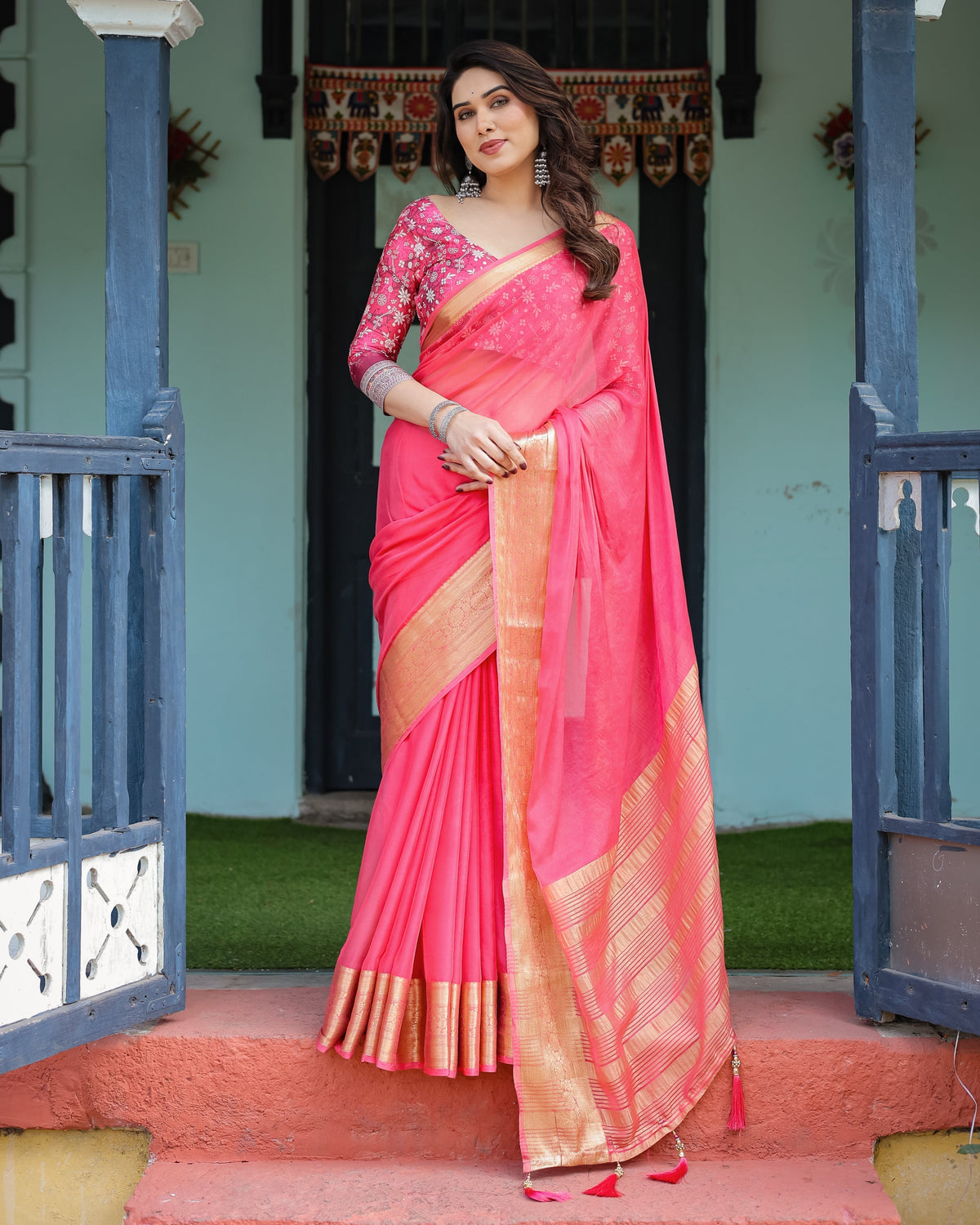 Ravishing Rani Pink Plain Chiffon Saree with Gold Zari Border, Floral Printed Blouse & Tassel Accents CHIFFON Main image