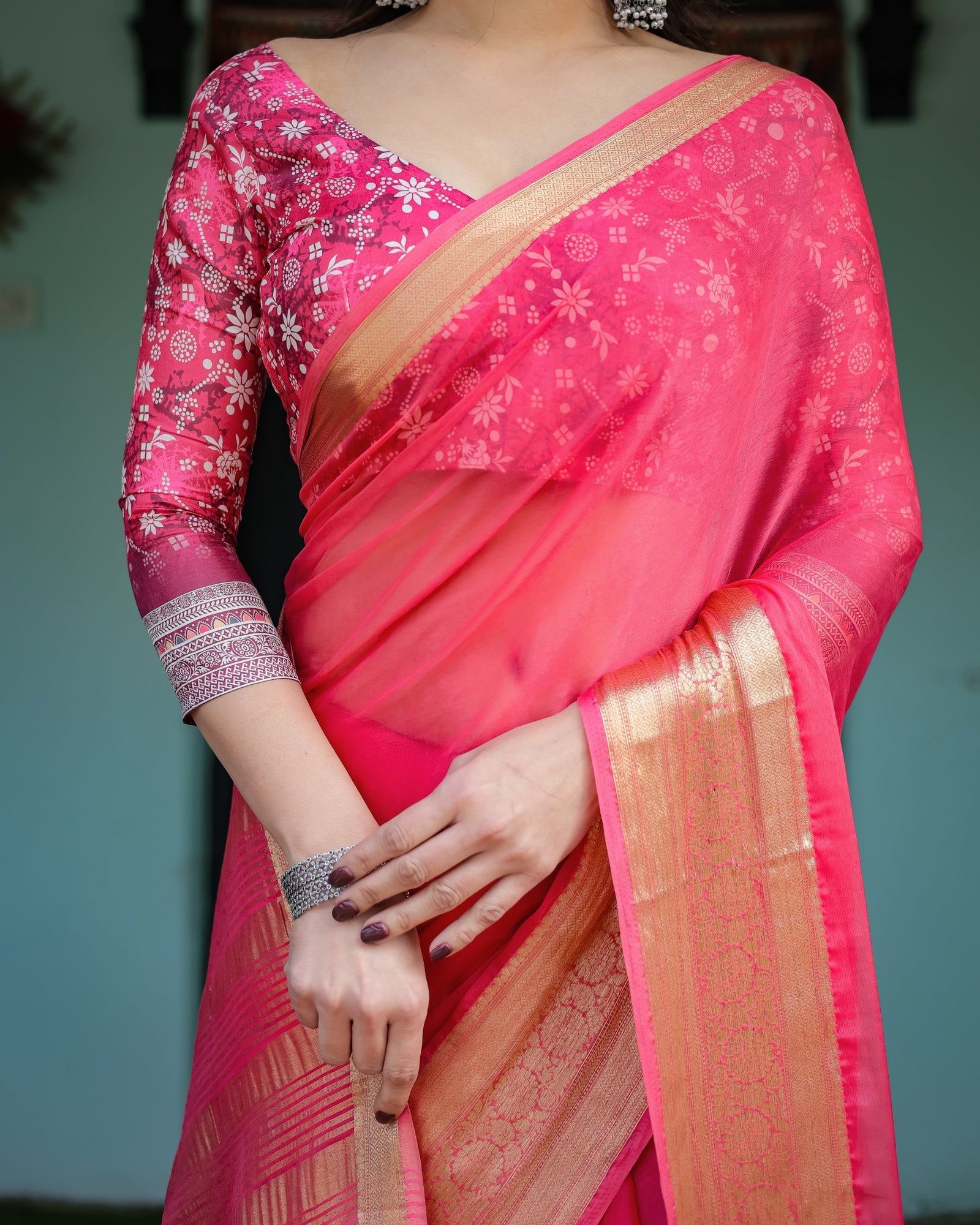 Ravishing Rani Pink Plain Chiffon Saree with Gold Zari Border, Floral Printed Blouse & Tassel Accents CHIFFON
