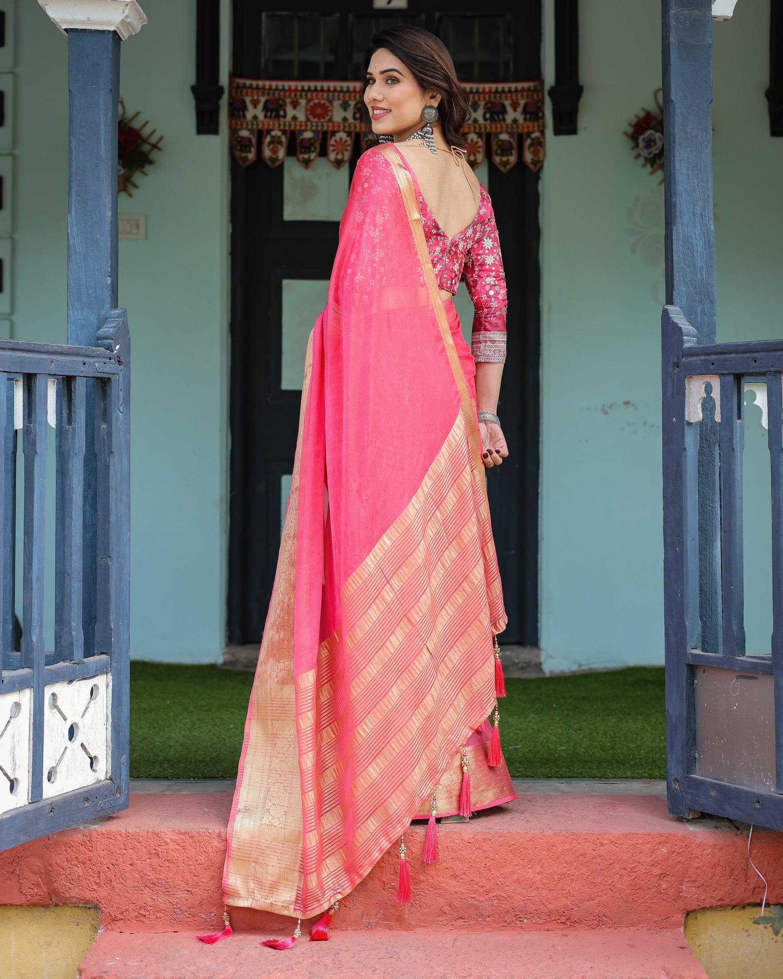 Ravishing Rani Pink Plain Chiffon Saree with Gold Zari Border, Floral Printed Blouse & Tassel Accents CHIFFON