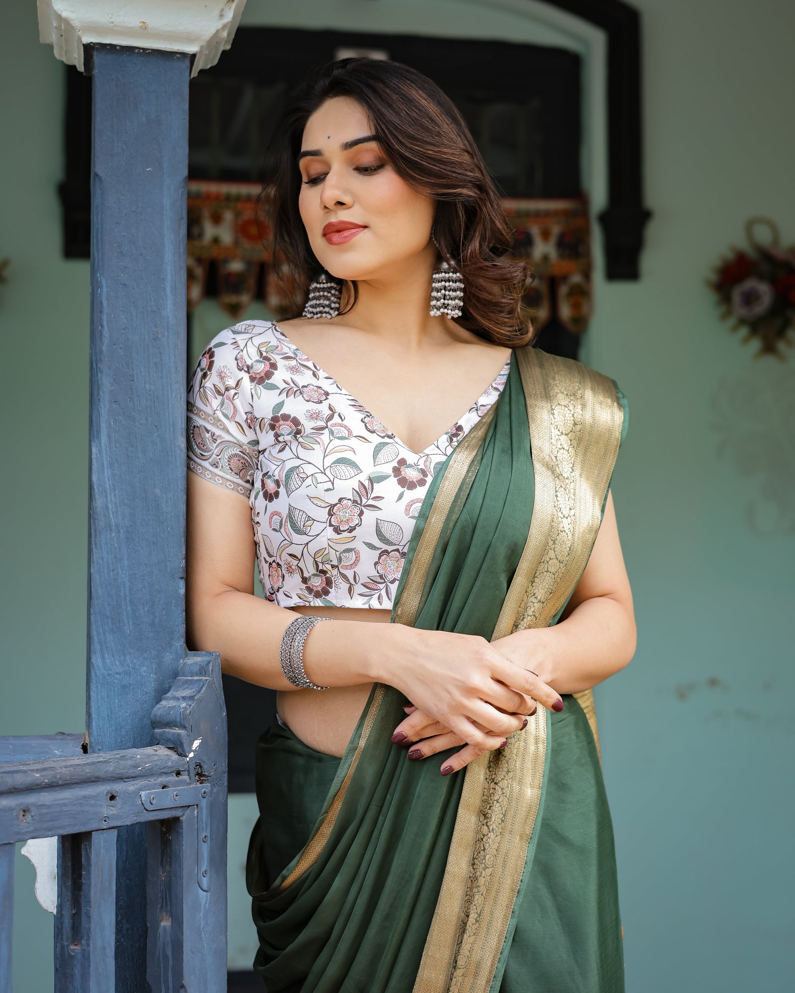 Elegant Bottle Green Plain Chiffon Saree with Gold Zari Border, Floral Printed Blouse & Tassel Finishing CHIFFON