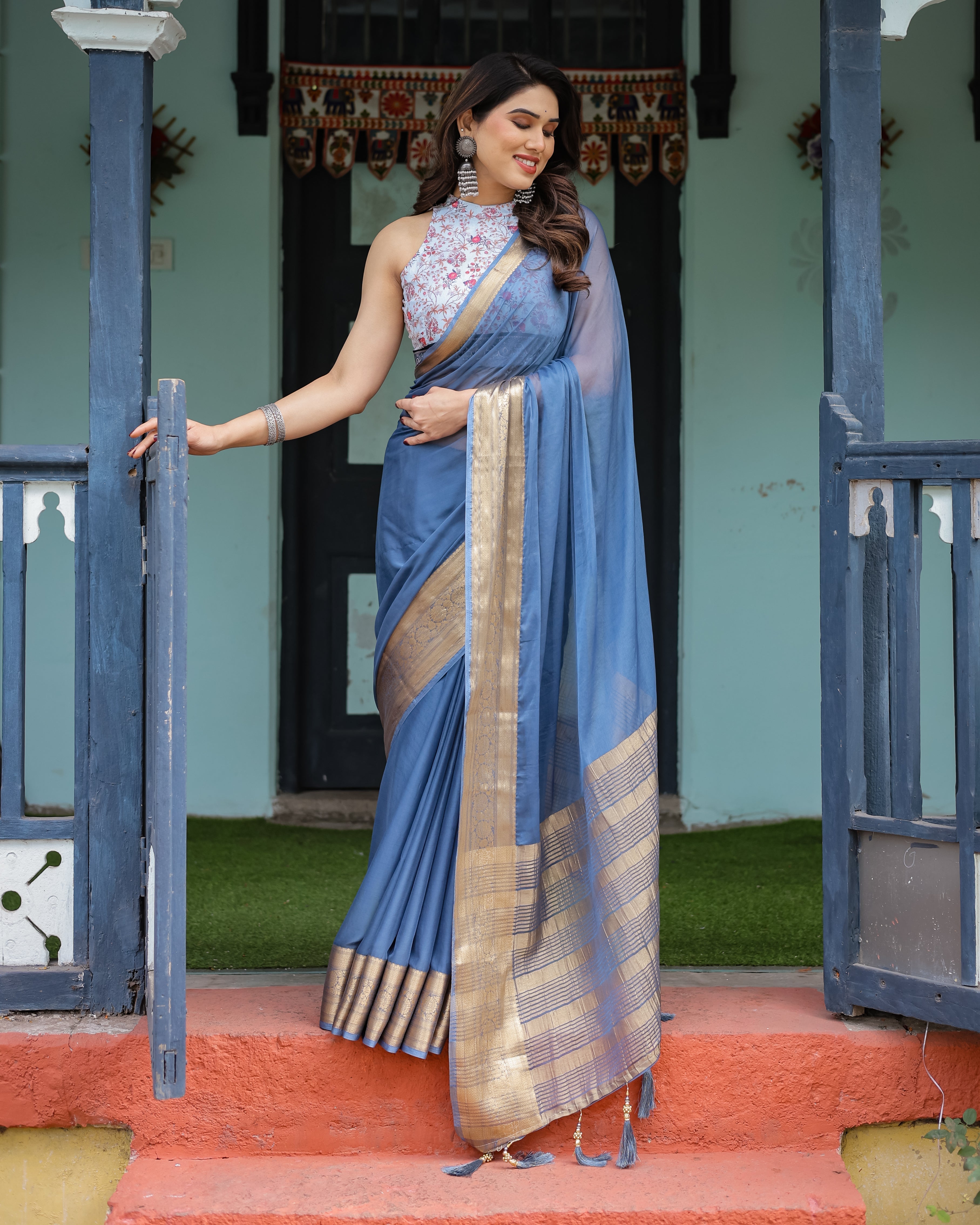 Serene Steel Blue Plain Chiffon Saree with Gold Zari Border, Floral Printed Blouse & Tassel Detailing CHIFFON Main image