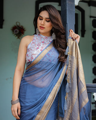 Serene Steel Blue Plain Chiffon Saree with Gold Zari Border, Floral Printed Blouse & Tassel Detailing CHIFFON