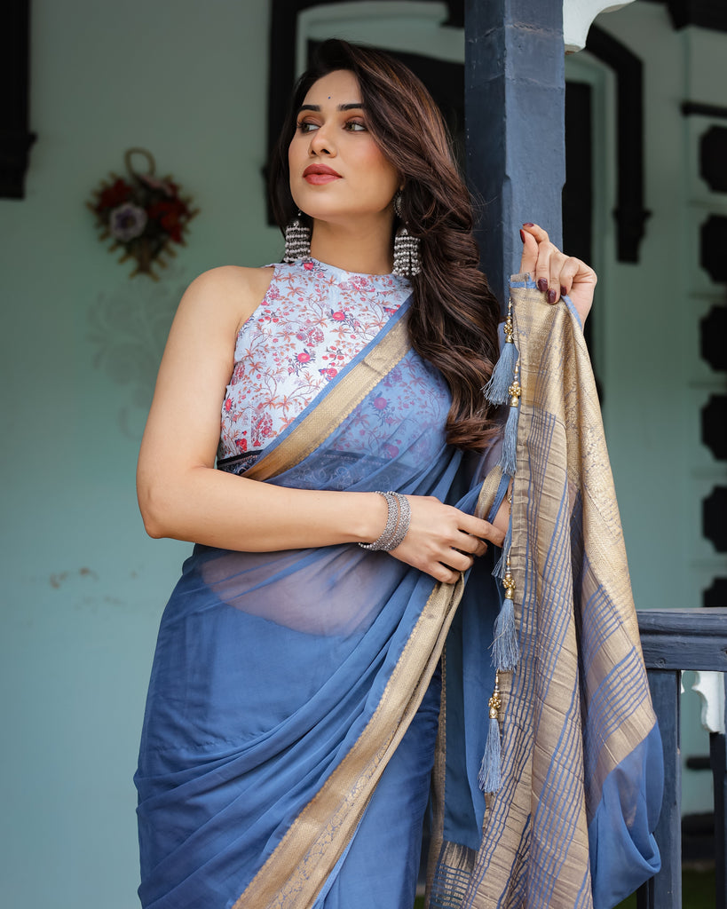 Serene Steel Blue Plain Chiffon Saree with Gold Zari Border, Floral Printed Blouse & Tassel Detailing CHIFFON