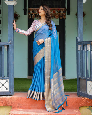 Vibrant Sky Blue Plain Chiffon Saree with Gold Zari Border, Floral Printed Blouse & Tassel Accents CHIFFON