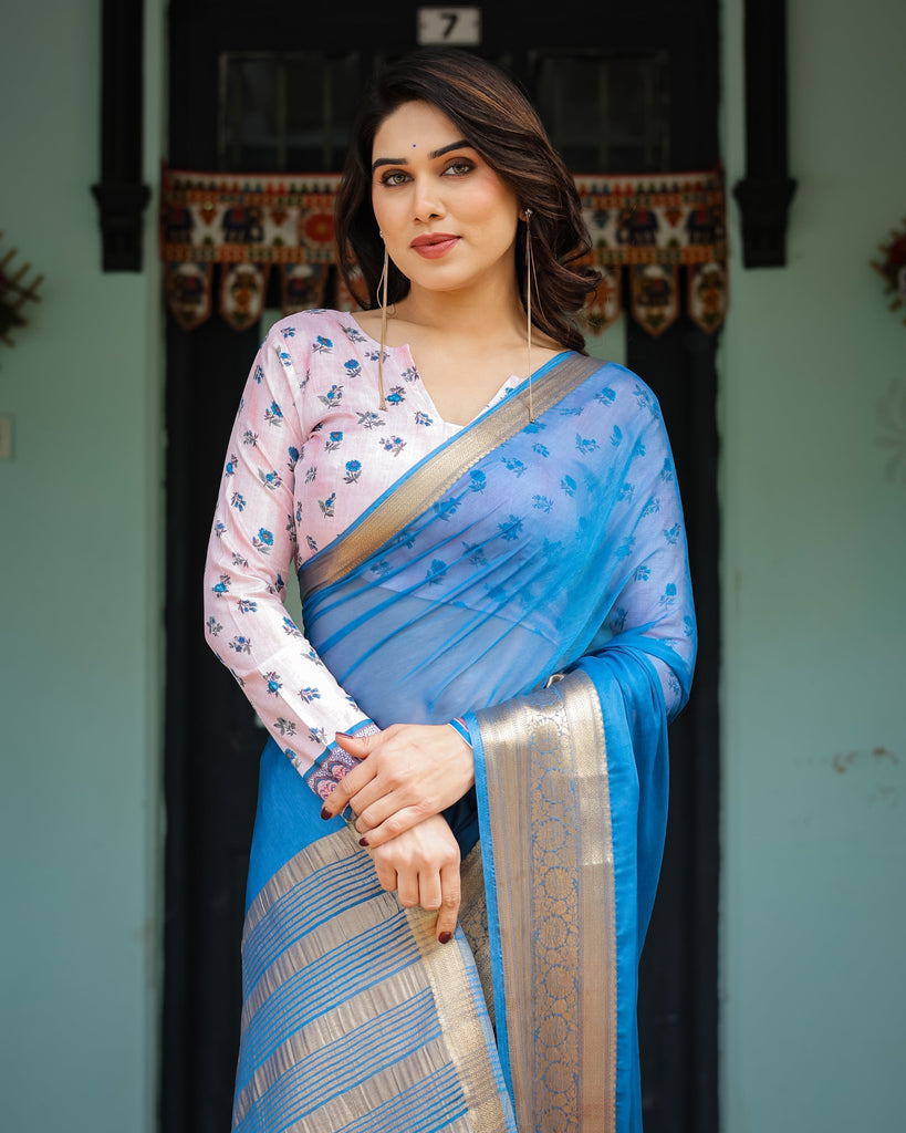 Vibrant Sky Blue Plain Chiffon Saree with Gold Zari Border, Floral Printed Blouse & Tassel Accents CHIFFON