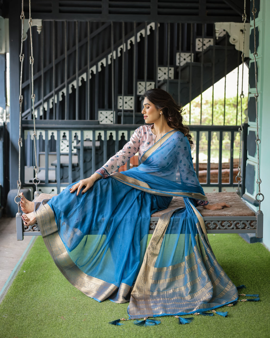 Vibrant Sky Blue Plain Chiffon Saree with Gold Zari Border, Floral Printed Blouse & Tassel Accents CHIFFON