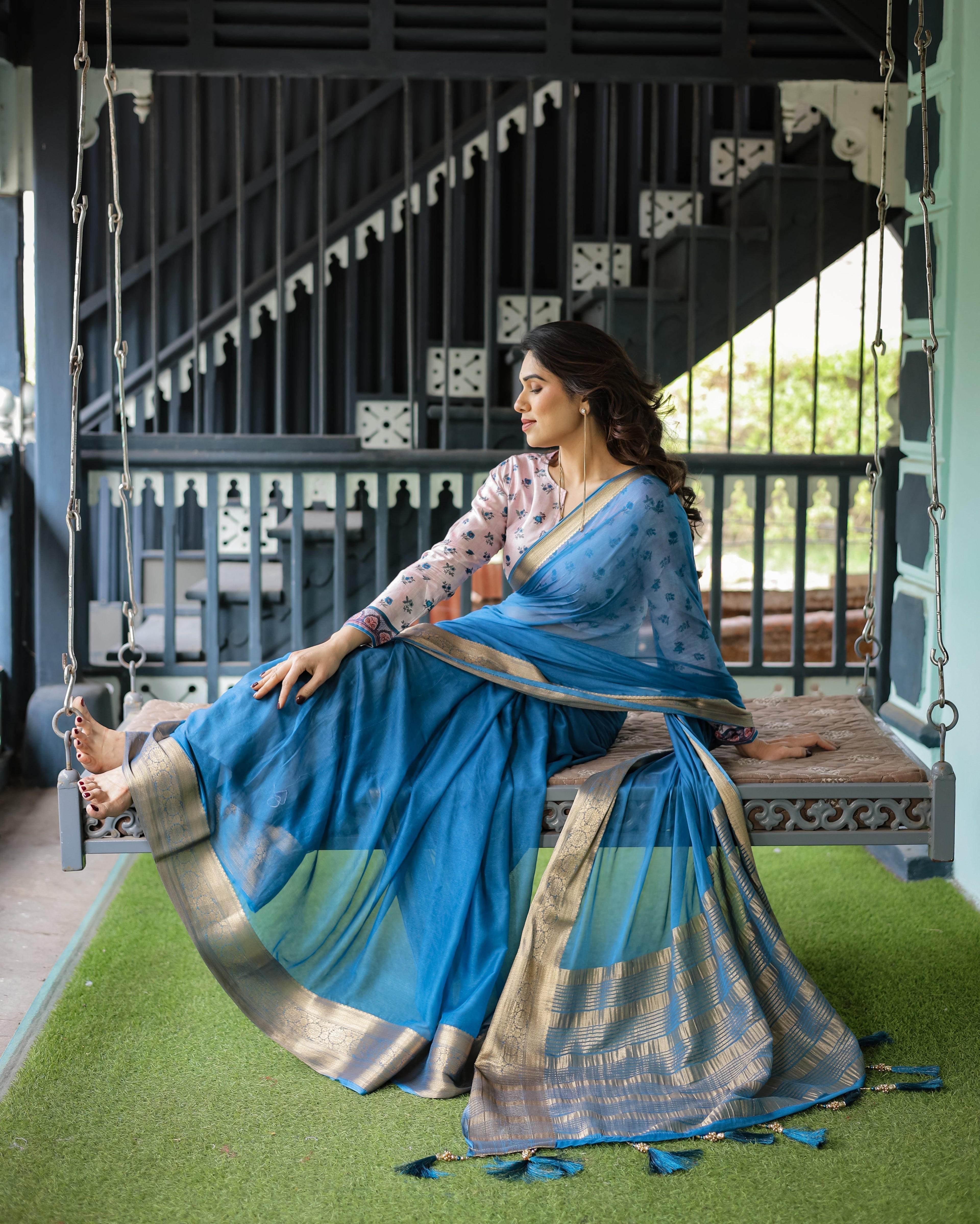 Vibrant Sky Blue Plain Chiffon Saree with Gold Zari Border, Floral Printed Blouse & Tassel Accents CHIFFON