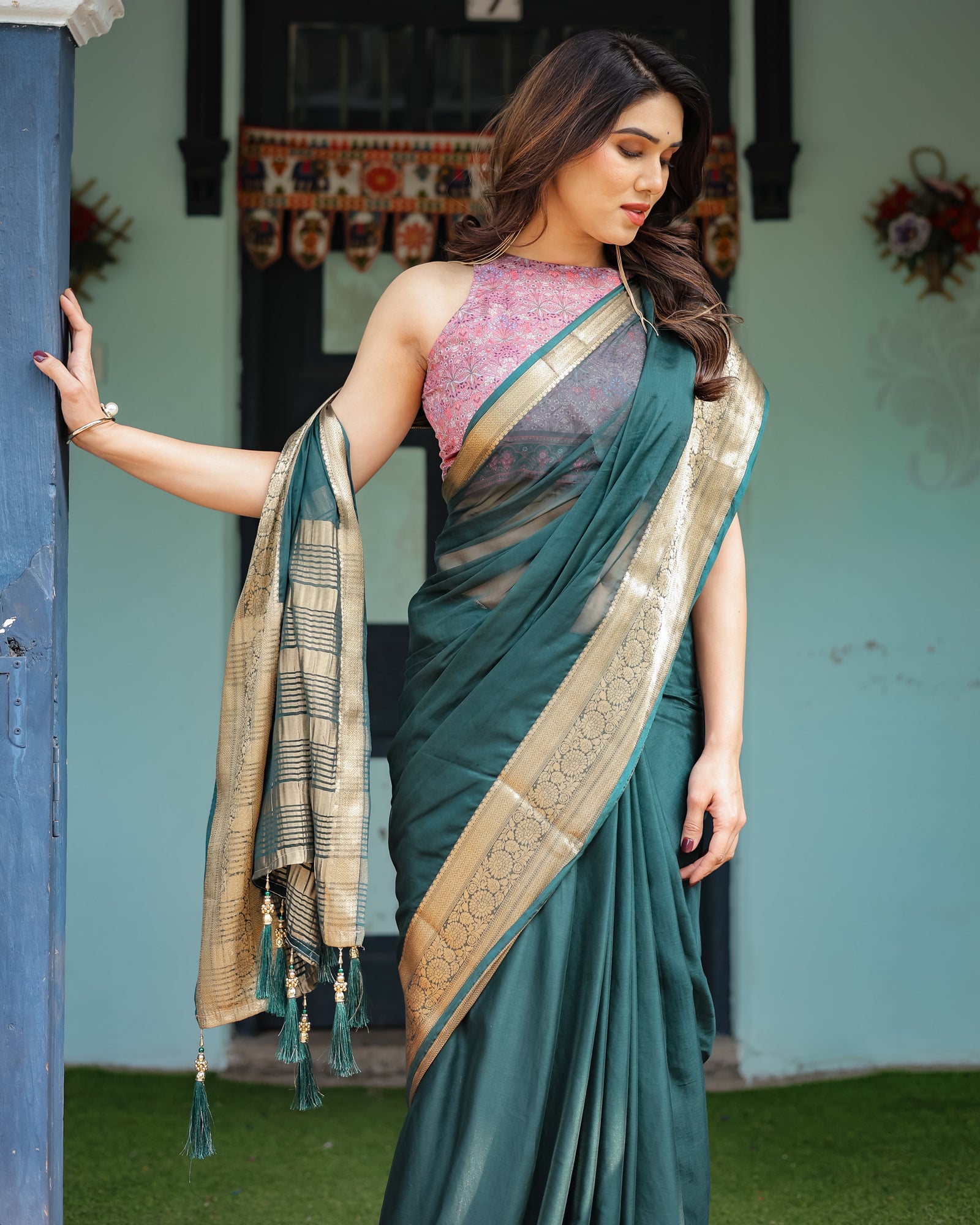 Enchanting Forest Green Plain Chiffon Saree with Gold Zari Border, Floral Printed Blouse & Tassel Details CHIFFON