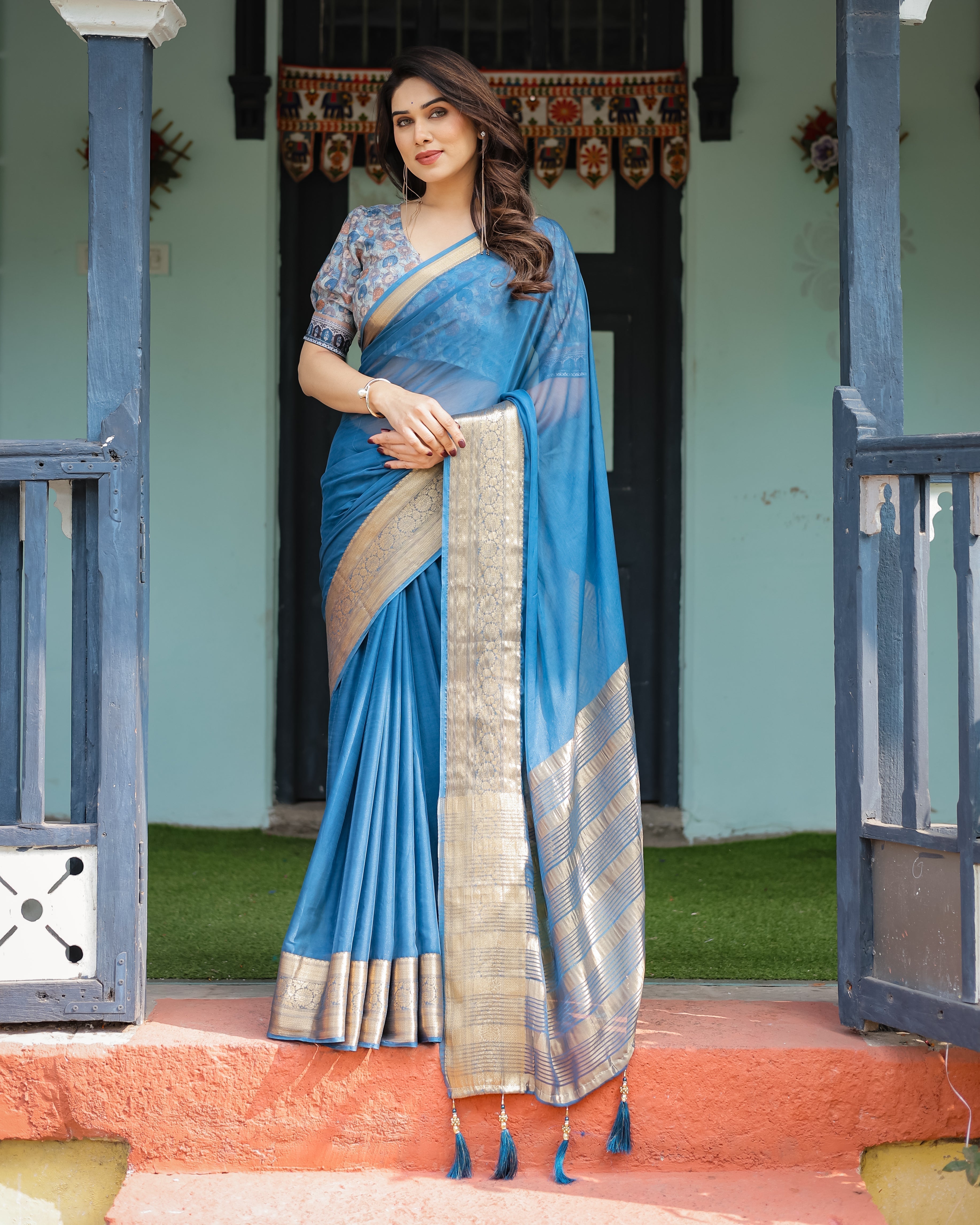 Vibrant Peacock Blue Plain Chiffon Saree with Gold Zari Border, Floral Printed Blouse & Tassel Accents Secondary image