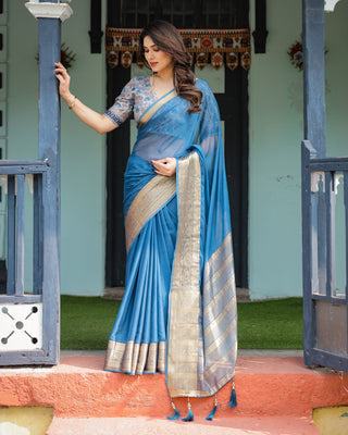 Vibrant Peacock Blue Plain Chiffon Saree with Gold Zari Border, Floral Printed Blouse & Tassel Accents CHIFFON