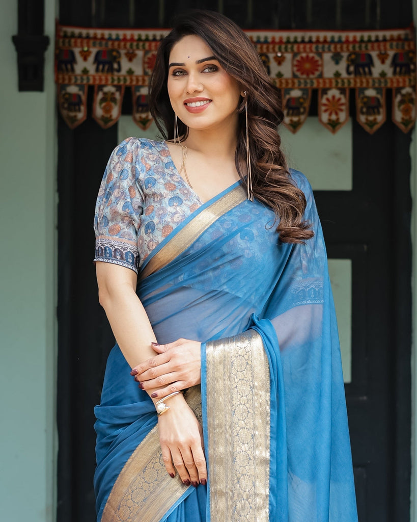 Vibrant Peacock Blue Plain Chiffon Saree with Gold Zari Border, Floral Printed Blouse & Tassel Accents CHIFFON