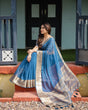 Load image into Gallery viewer, Vibrant Peacock Blue Plain Chiffon Saree with Gold Zari Border, Floral Printed Blouse &amp; Tassel Accents CHIFFON