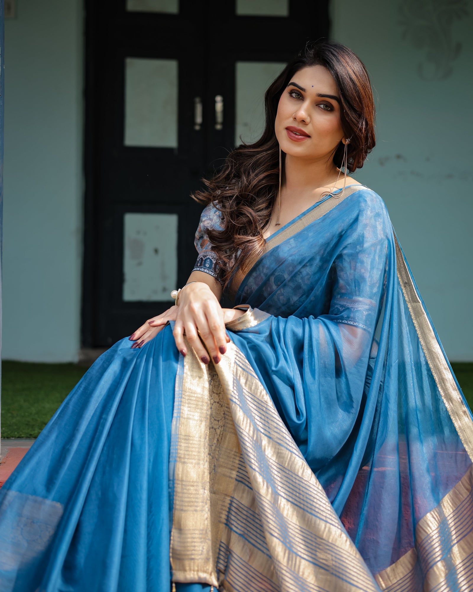 Vibrant Peacock Blue Plain Chiffon Saree with Gold Zari Border, Floral Printed Blouse & Tassel Accents CHIFFON