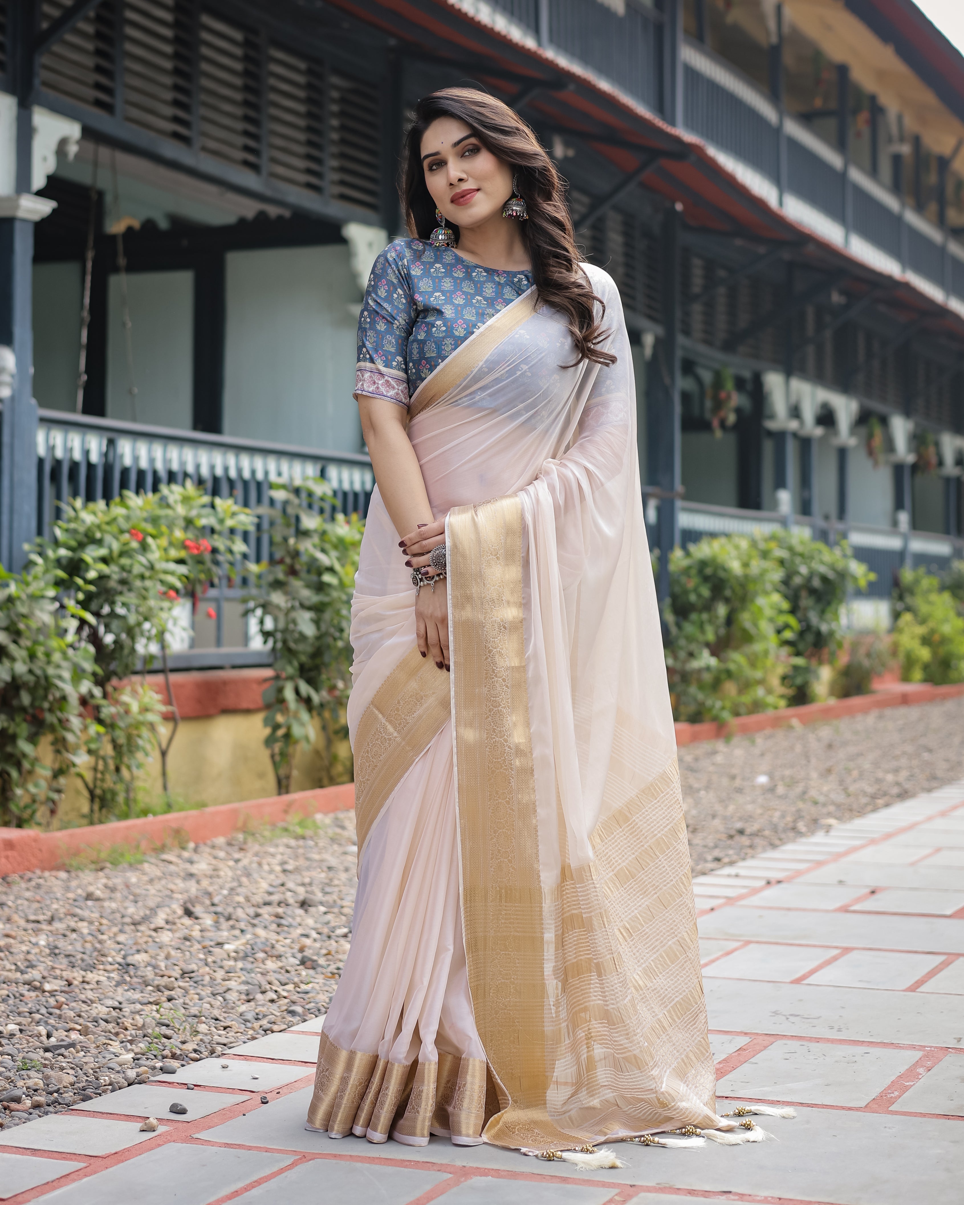 Ivory White Plain Chiffon Saree with Gold Zari Border, Floral Printed Blouse & Tassel Detailing CHIFFON Main image