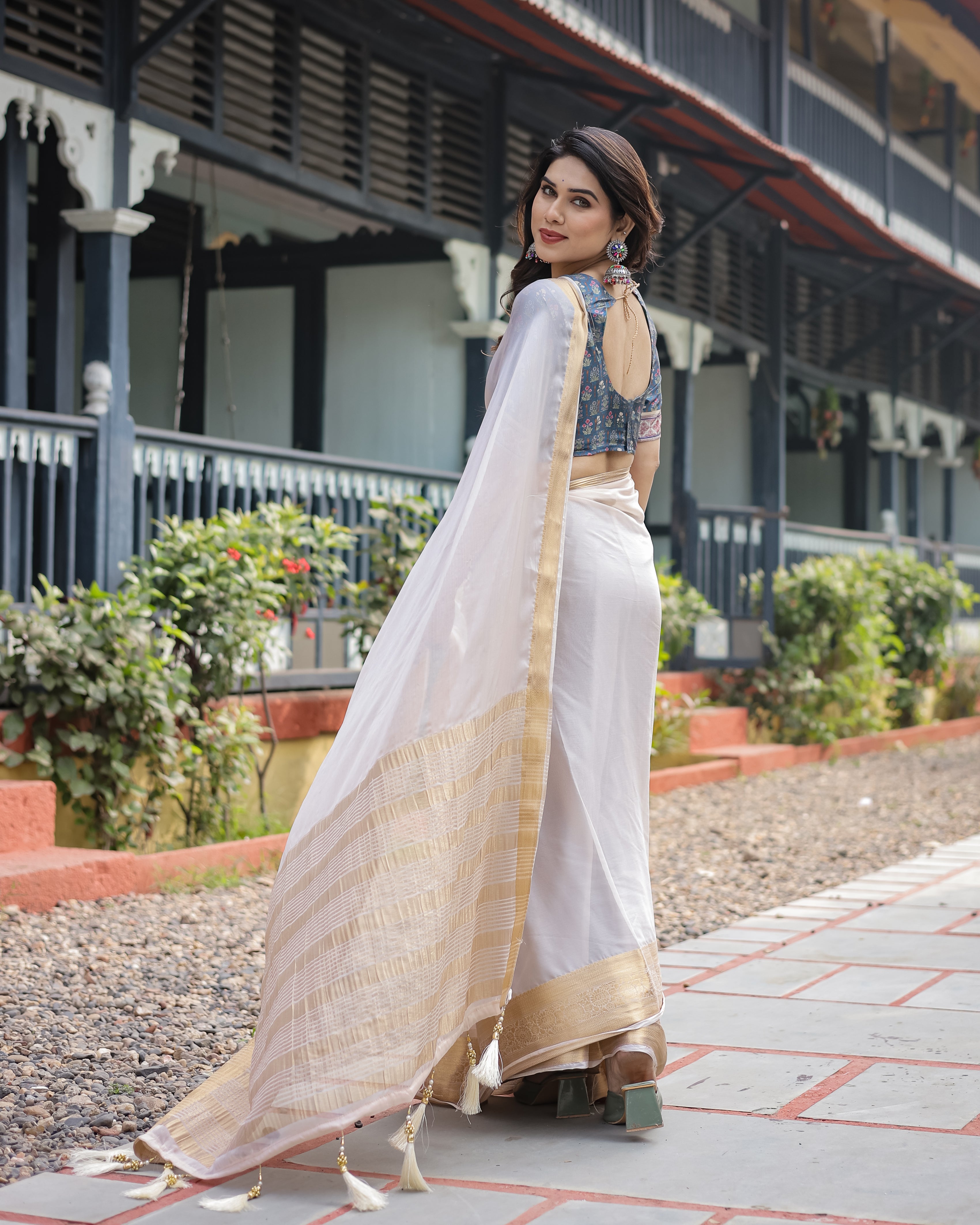 Ivory White Plain Chiffon Saree with Gold Zari Border, Floral Printed Blouse & Tassel Detailing CHIFFON
