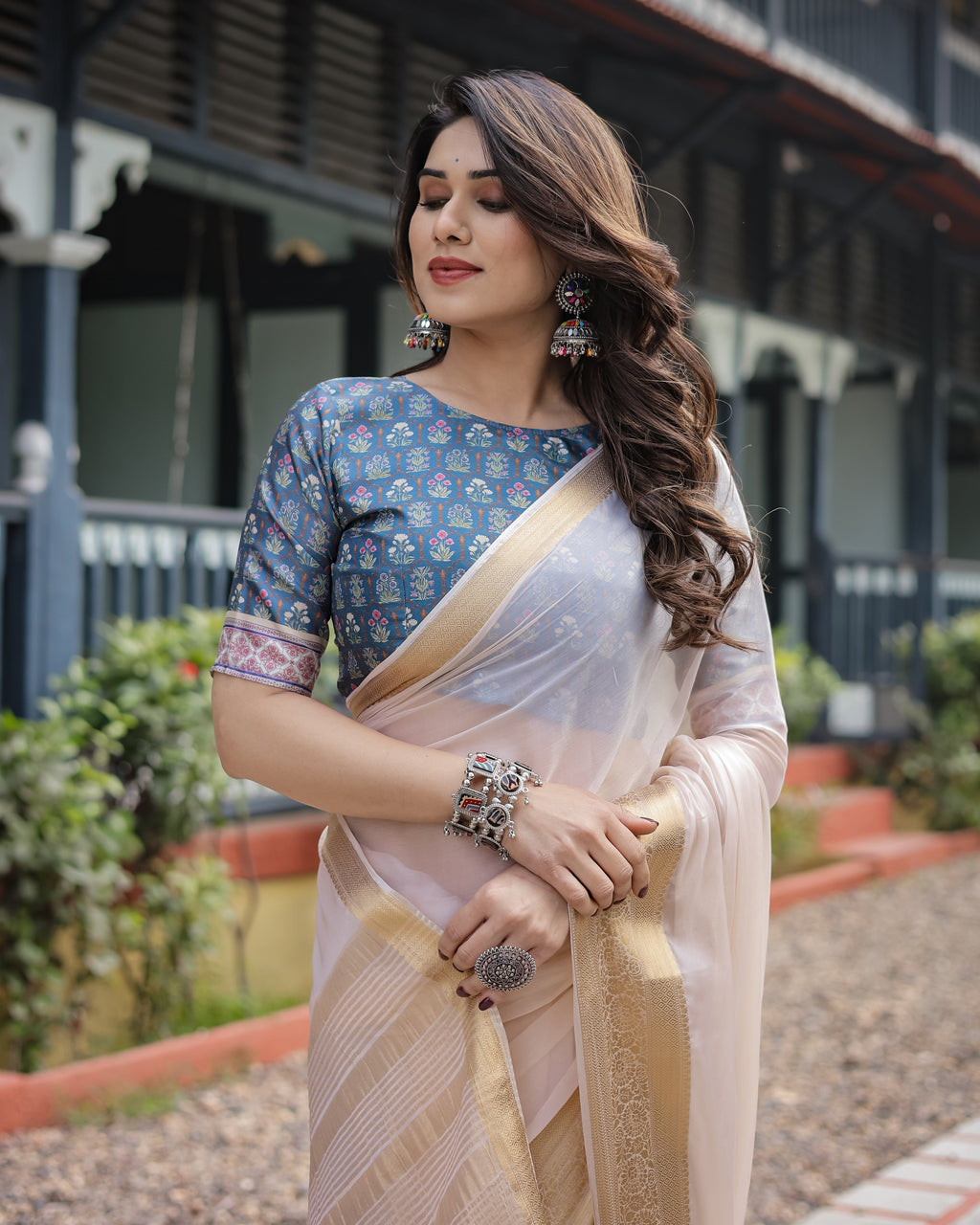 Ivory White Plain Chiffon Saree with Gold Zari Border, Floral Printed Blouse & Tassel Detailing CHIFFON