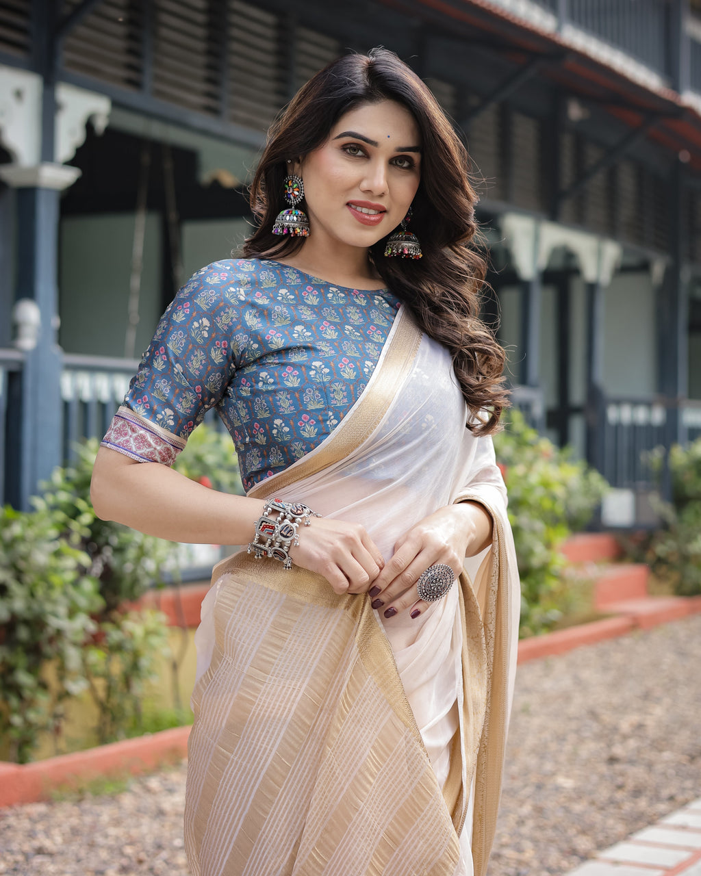 Ivory White Plain Chiffon Saree with Gold Zari Border, Floral Printed Blouse & Tassel Detailing CHIFFON