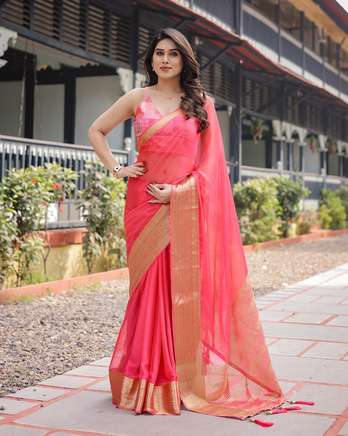 Flamingo Pink Plain Chiffon Saree with Gold Zari Border, Patterned Blouse & Tassel Detailing CHIFFON Main image