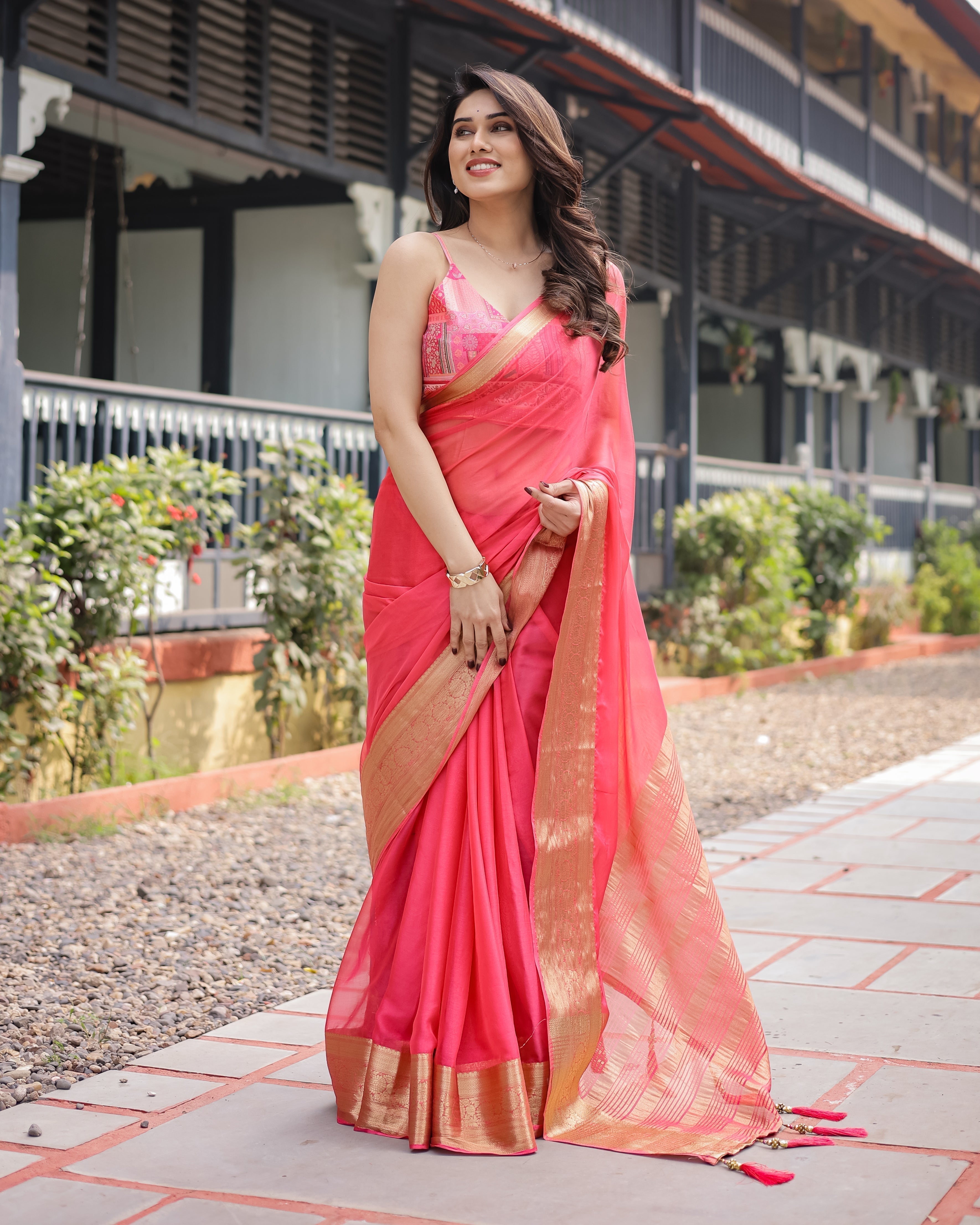 Flamingo Pink Plain Chiffon Saree with Gold Zari Border, Patterned Blouse & Tassel Detailing Secondary image