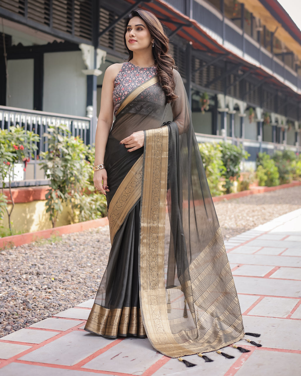 Ethereal Black Plain Chiffon Saree with Gold Zari Border, Floral Printed Blouse & Tassel Detailing CHIFFON