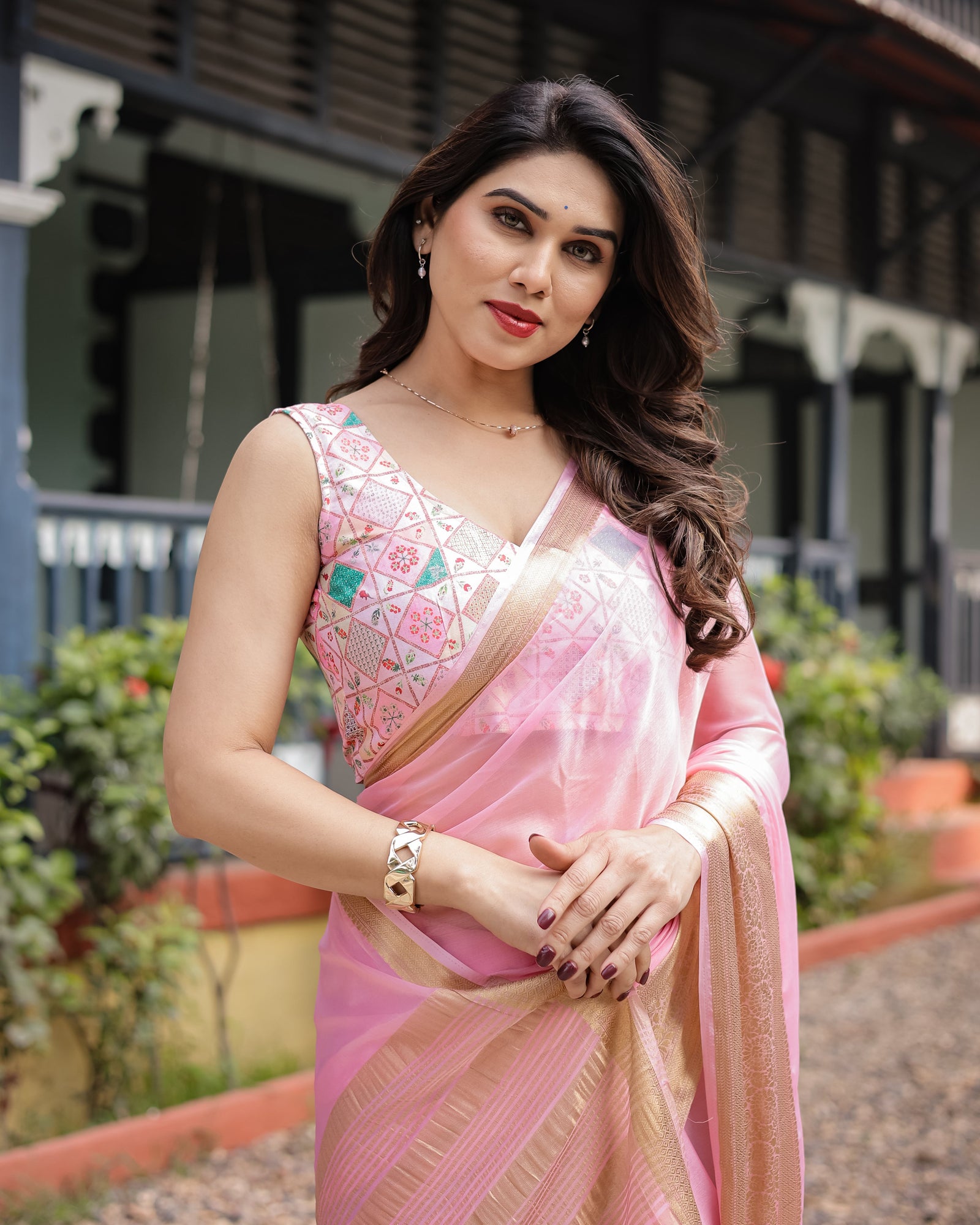 Soft Baby Pink Plain Chiffon Saree with Gold Zari Border, Geometric Embroidered Blouse & Tassel Detailing CHIFFON