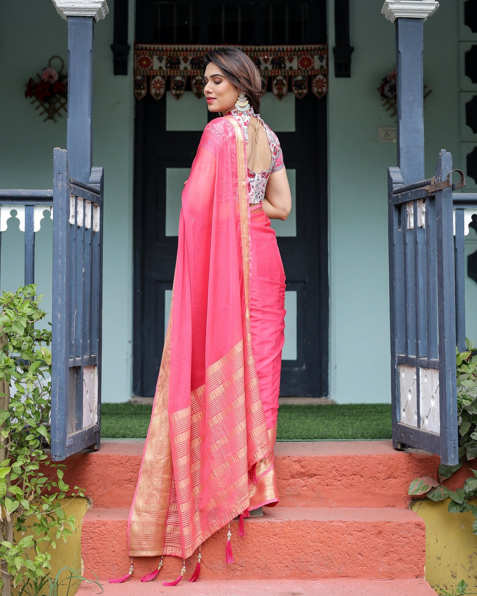 Raspberry Pink Plain Chiffon Saree with Gold Zari Border, High-Neck Floral Printed Blouse & Tassel Detailing CHIFFON