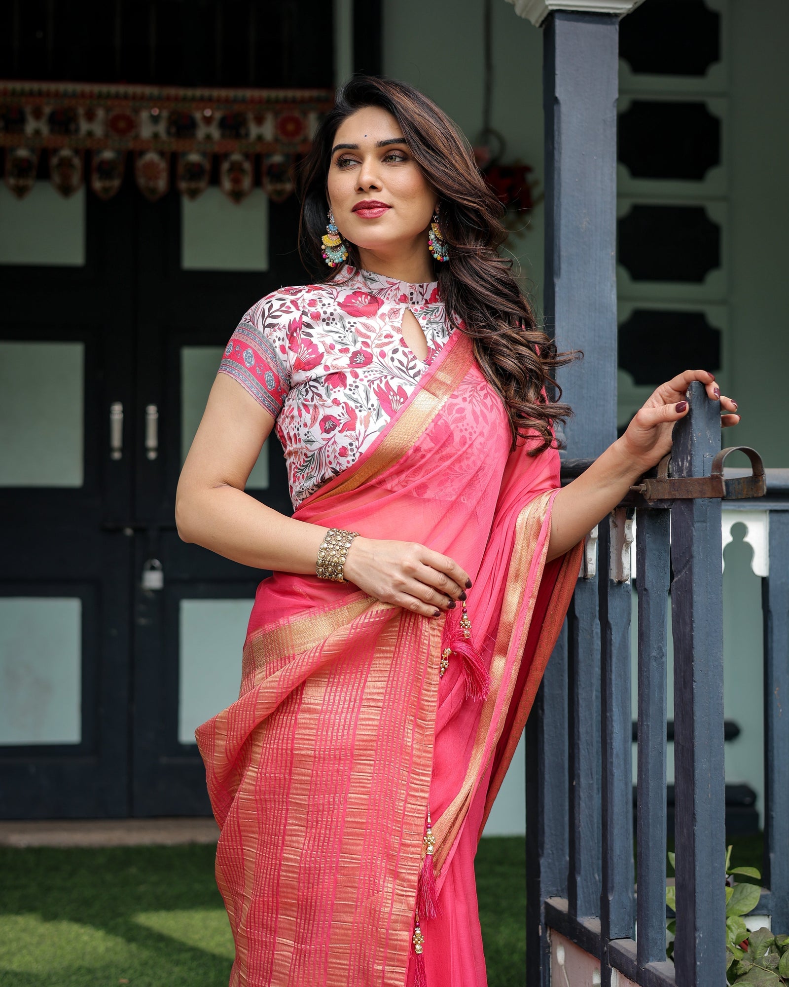 Raspberry Pink Plain Chiffon Saree with Gold Zari Border, High-Neck Floral Printed Blouse & Tassel Detailing CHIFFON