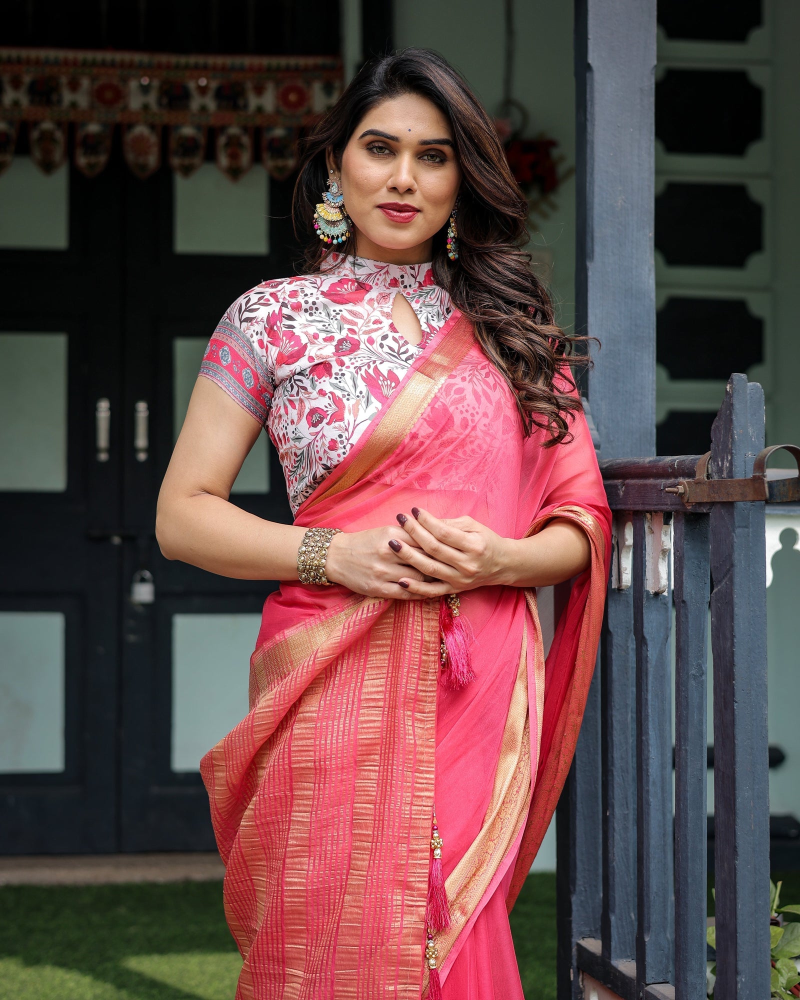 Raspberry Pink Plain Chiffon Saree with Gold Zari Border, High-Neck Floral Printed Blouse & Tassel Detailing CHIFFON
