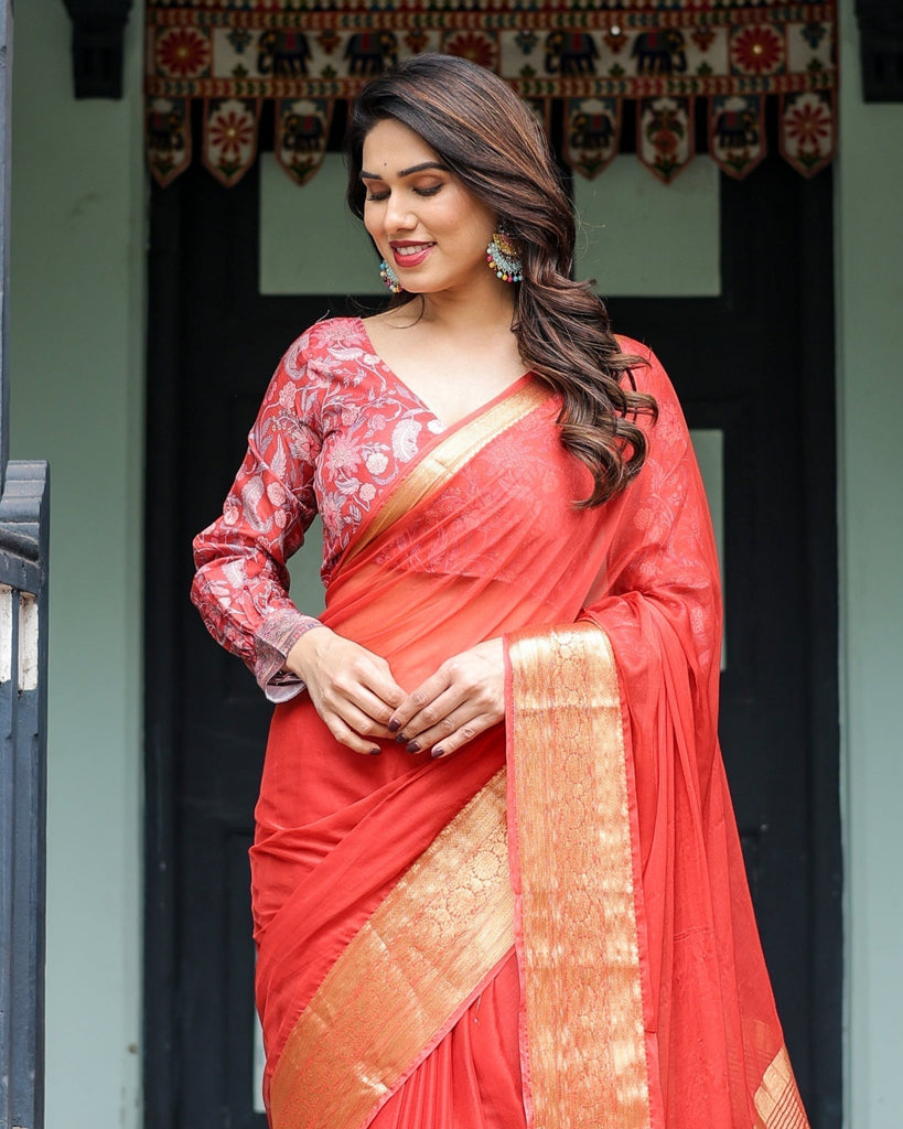 Fiery Red Plain Chiffon Saree with Gold Zari Border, Full-Sleeve Floral Blouse & Tassel Detailing CHIFFON