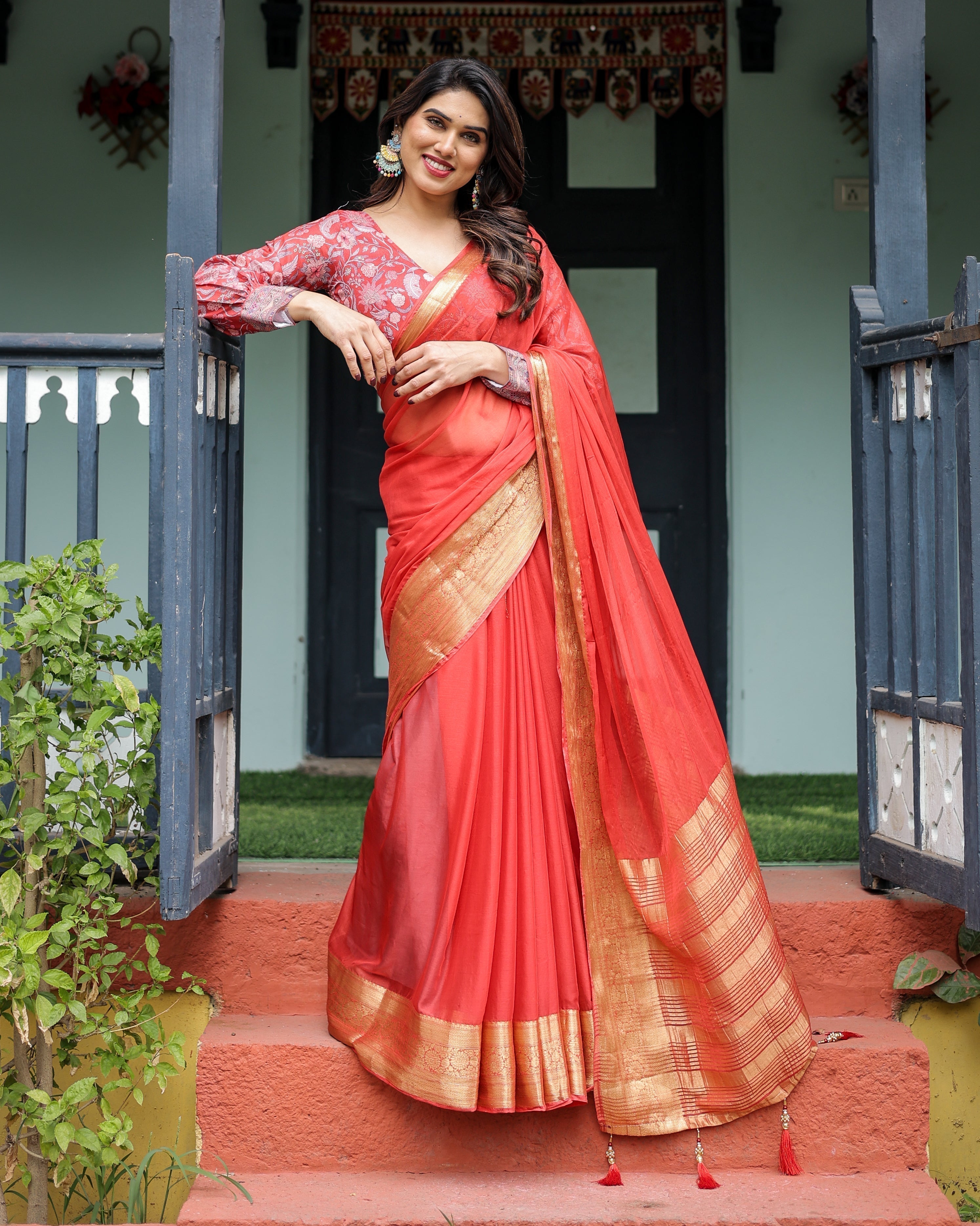 Fiery Red Plain Chiffon Saree with Gold Zari Border, Full-Sleeve Floral Blouse & Tassel Detailing Secondary image