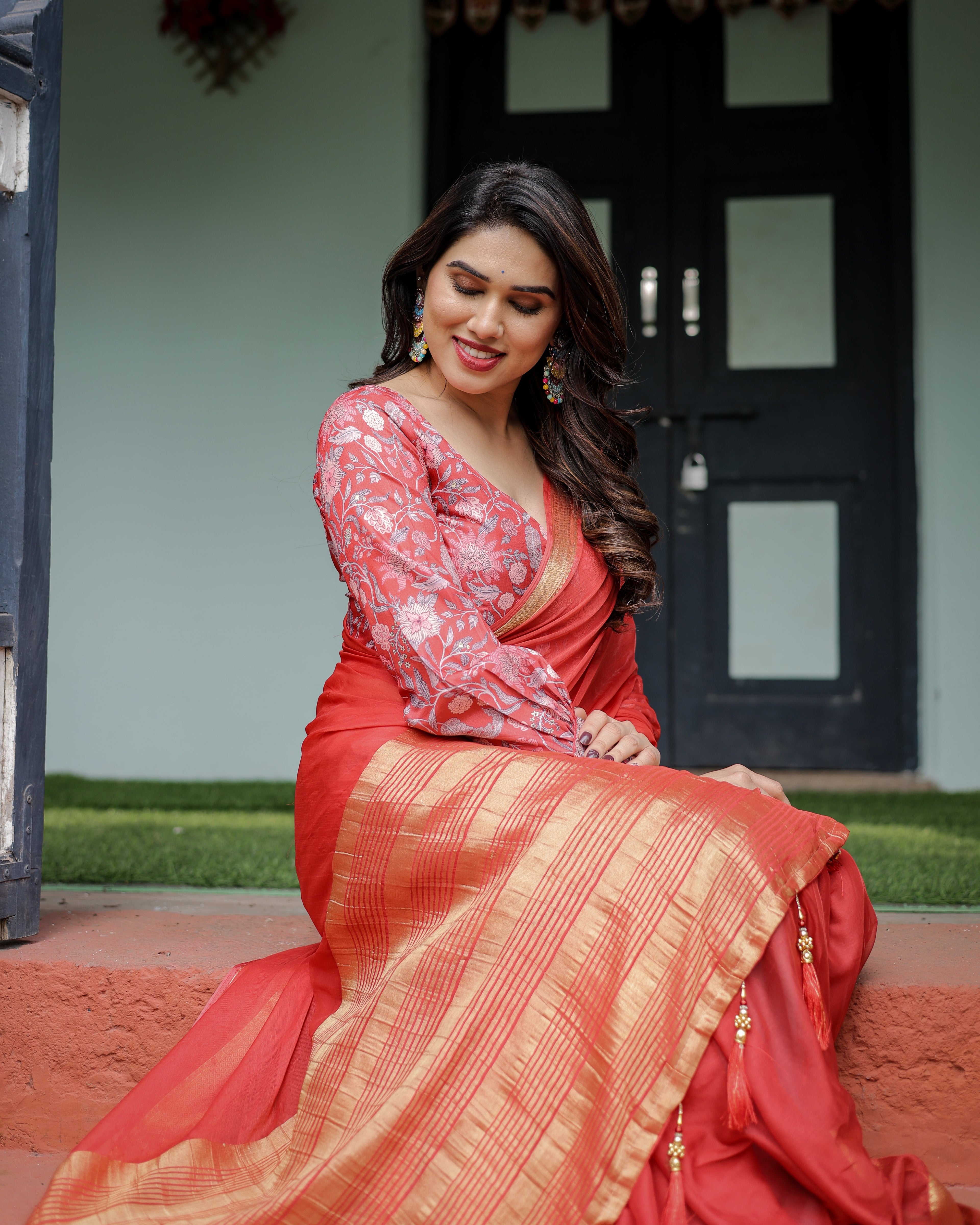Fiery Red Plain Chiffon Saree with Gold Zari Border, Full-Sleeve Floral Blouse & Tassel Detailing CHIFFON