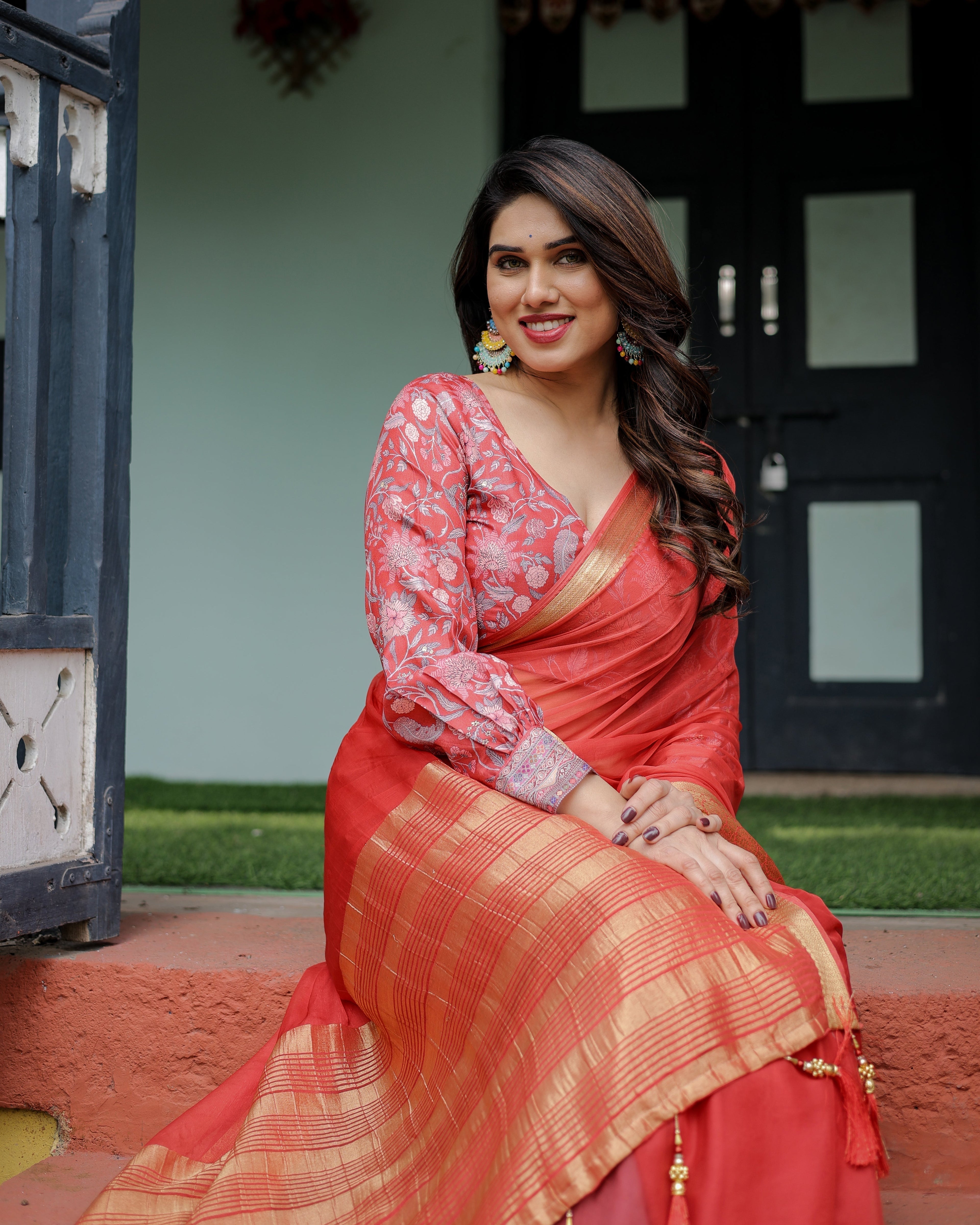 Fiery Red Plain Chiffon Saree with Gold Zari Border, Full-Sleeve Floral Blouse & Tassel Detailing CHIFFON