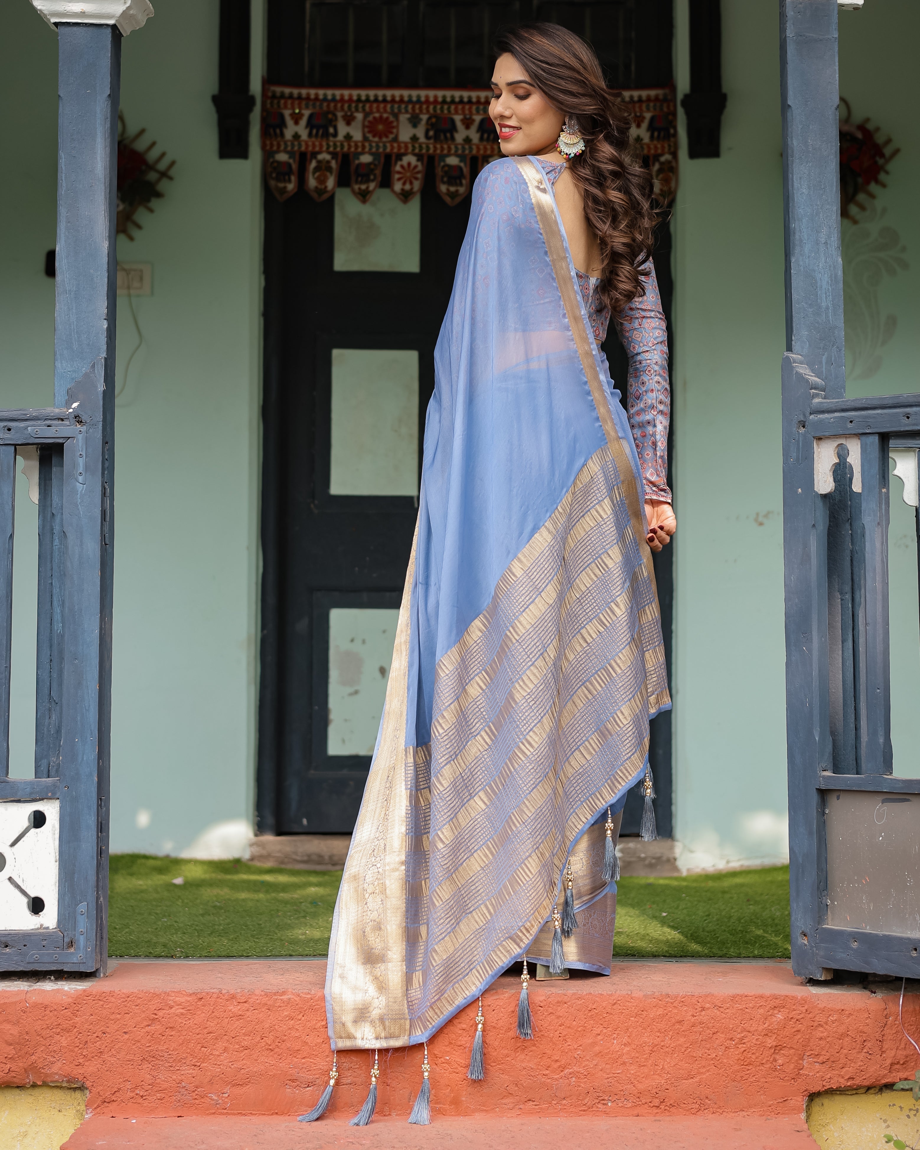 Sky Blue Plain Chiffon Saree with Gold Zari Border, Geometric Printed Blouse & Tassel Detailing CHIFFON