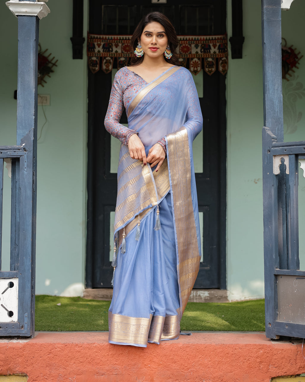 Sky Blue Plain Chiffon Saree with Gold Zari Border, Geometric Printed Blouse & Tassel Detailing CHIFFON