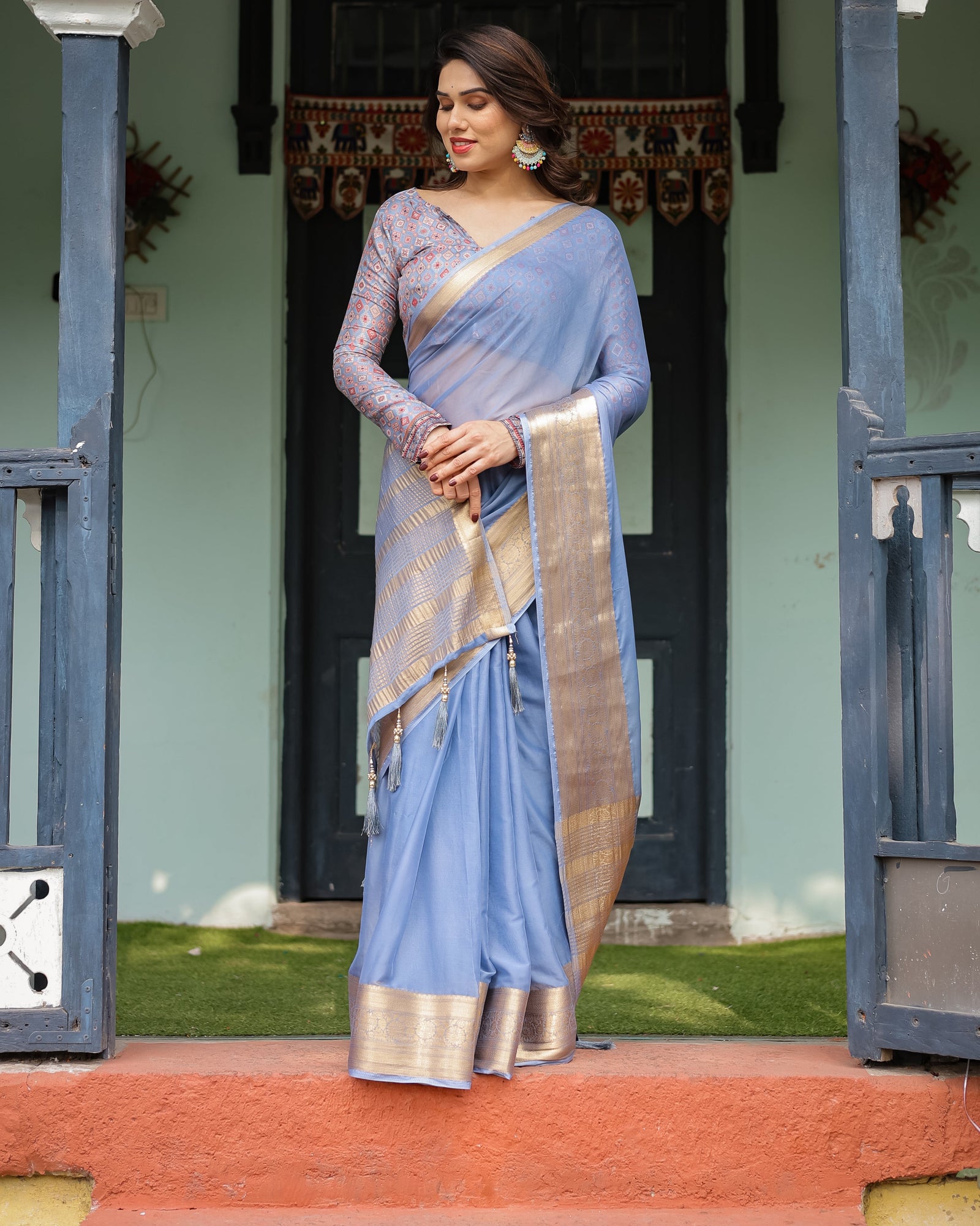 Sky Blue Plain Chiffon Saree with Gold Zari Border, Geometric Printed Blouse & Tassel Detailing CHIFFON